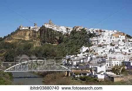 Stock Image - "The White Town of Arcos de la Frontera above the Guadalete river, Cadiz province, Andalusia, Spain, Europe". Fotosearch