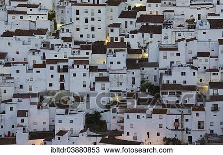 "The White Town of Casares clings to a steep hillside, at dawn, Malaga province, Andalusia, Spain, Europe" View Large Photo Image Stock Image - "The White Town of Casares clings to a steep hillside, at dawn, Malaga province, Andalusia, Spain, Europe". Fotosearch