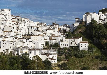 Stock Photo - "The White Town of Casares clings to a steep hillside, Malaga province, Andalusia, Spain, Europe". Fotosearch