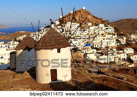 "The Windmills overlooking Chora town, Ios Cylcades Islands, Greece, Europe" View Large Photo Image Stock Image - "The Windmills overlooking Chora town, Ios Cylcades Islands, Greece, Europe". Fotosearch