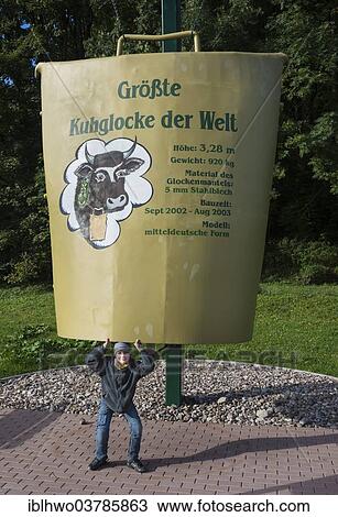 "The world's largest cowbell, 2003, boy posing underneath the bell, Kleinschmalkalden, Floh-Seligenthal, Thuringia, Germany, Europe" View Large Photo Image Stock Image - "The world's largest cowbell, 2003, boy posing underneath the bell, Kleinschmalkalden, Floh-Seligenthal, Thuringia, Germany, Europe". Fotosearch