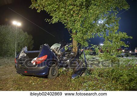 Stock Photo - "The wreckage of a Peugeot after fatally crashing into a tree, on the B 29, Schorndorf, Baden-Wuerttemberg, Germany, Europe". Fotosearch