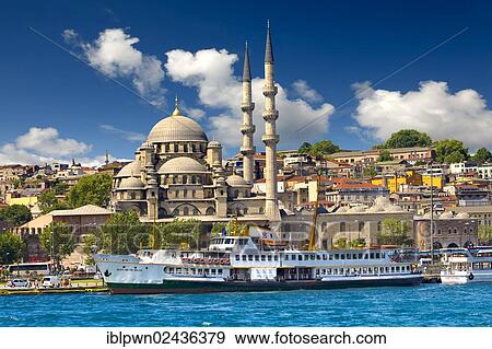 Stock Photo - "The Yeni Mosque, New Mosque, the construction was ordered in 1597 by Safiye Sultan, on the banks of the Golden Horn, in front of a ferry, Istanbul, Turkey, Asia". Fotosearch