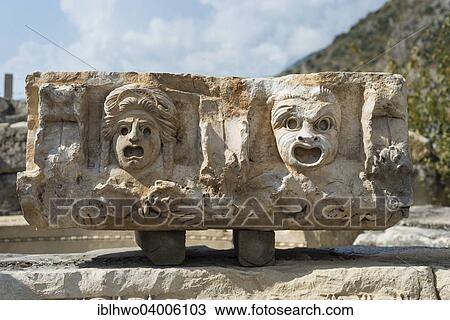 "Theatre masks, reliefs on stone block from the Roman amphitheatre, ancient city of Myra, Demre, Antalya Province, Turkey, Asia" View Large Photo Image Stock Image - "Theatre masks, reliefs on stone block from the Roman amphitheatre, ancient city of Myra, Demre, Antalya Province, Turkey, Asia". Fotosearch