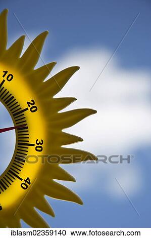 Thermometer shaped like a sunflower View Large Photo Image Stock Image - Thermometer shaped like a sunflower. Fotosearch