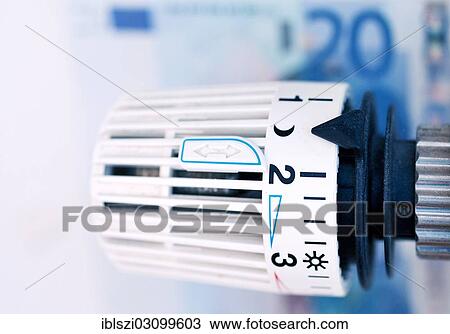 "Thermostat in front of a euro banknote, symbolic image for heating costs, Germany, Europe" View Large Photo Image Stock Image - "Thermostat in front of a euro banknote, symbolic image for heating costs, Germany, Europe". Fotosearch