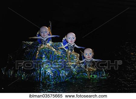 "Three boys on Turtle, The Magic Flute by Wolfgang Amadeus Mozart, opera performance on the floating stage on Lake Constance, Bregenz Festival 2013, Bregenz, Vorarlberg, Austria, Europe" View Large Photo Image Stock Photography - "Three boys on Turtle, The Magic Flute by Wolfgang Amadeus Mozart, opera performance on the floating stage on Lake Constance, Bregenz Festival 2013, Bregenz, Vorarlberg, Austria, Europe". Fotosearch