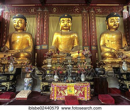 Stock Photo - "Three Buddha statues, Temple of the Six Banyan Trees, Guangzhou or Canton, China, Asia". Fotosearch