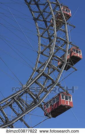 "Three cabins of the Wiener Riesenrad ferris wheel against a blue sky at the Prater, Vienna, Austria, Europe" View Large Photo Image Stock Image - "Three cabins of the Wiener Riesenrad ferris wheel against a blue sky at the Prater, Vienna, Austria, Europe". Fotosearch