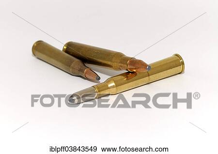 "Three cartridges, bullets, lying side by side" View Large Photo Image Stock Photo - "Three cartridges, bullets, lying side by side". Fotosearch