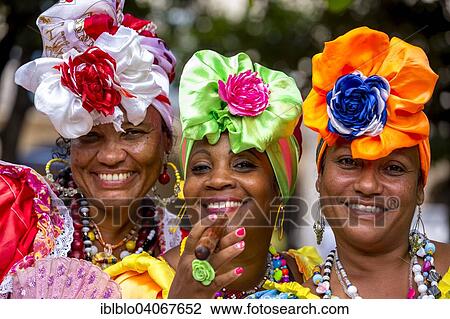"Three Cuban women in colorful Spanish-inspired costumes, Havana, Cuba, North America" View Large Photo Image Stock Image - "Three Cuban women in colorful Spanish-inspired costumes, Havana, Cuba, North America". Fotosearch