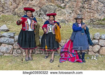"Three elderly women wearing hats, Quechua Indians in traditional dress spinning wool with wooden spindles, Cinchero, Urubamba Valley, Peru, South America" View Large Photo Image Stock Image - "Three elderly women wearing hats, Quechua Indians in traditional dress spinning wool with wooden spindles, Cinchero, Urubamba Valley, Peru, South America". Fotosearch