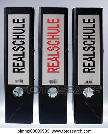 Stock Image - "Three file folders labeled """"Realschule"""", German for """"middle school""""". Fotosearch