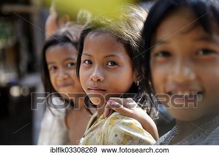 "Three girls, portrait, Trapang Village, Bathi District, Takeo Province, Cambodia, Asia" View Large Photo Image Stock Photo - "Three girls, portrait, Trapang Village, Bathi District, Takeo Province, Cambodia, Asia". Fotosearch