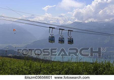 "Three gondolas at Mt Niederhorn, Lake Thun, Bernese Oberland, Switzerland, Europe" View Large Photo Image Stock Image - "Three gondolas at Mt Niederhorn, Lake Thun, Bernese Oberland, Switzerland, Europe". Fotosearch