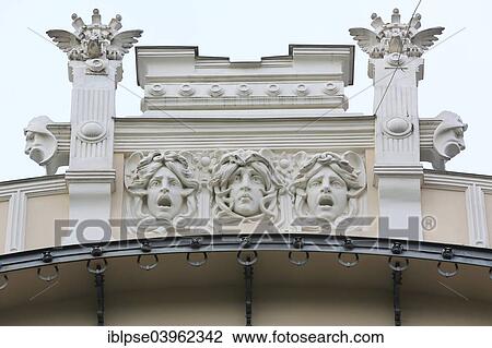 Stock Image - "Three heads of Medusa on the facade of the house Alberta iela, Albert Street 4 Art Nouveau Lyebedinskiy apartment house, architect Mikhail Eisenstein, Riga, Latvia, Europe". Fotosearch