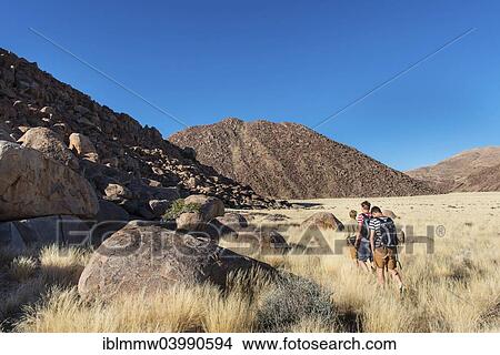 "Three hikers at the Naukluft Mountains, Namib-Naukluft, Namibia, Africa" View Large Photo Image Picture - "Three hikers at the Naukluft Mountains, Namib-Naukluft, Namibia, Africa". Fotosearch