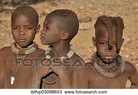 Stock Image - "Three Himba girls, portrait, Okongwati, Kaokoland, Kunene, Namibia, Africa". Fotosearch