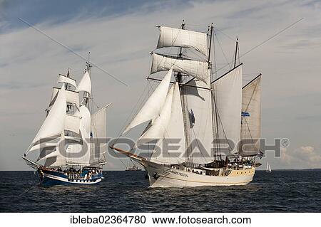 "Three-masted schooner, Mare Frisium, in front of the Baltic Beauty, during Hanse Sail 2012, Warnemuende, Mecklenburg-Western Pomerania, Germany, Europe" View Large Photo Image Stock Image - "Three-masted schooner, Mare Frisium, in front of the Baltic Beauty, during Hanse Sail 2012, Warnemuende, Mecklenburg-Western Pomerania, Germany, Europe". Fotosearch