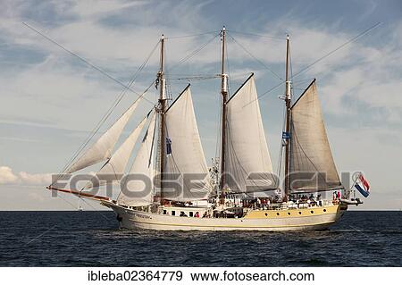 "Three-masted schooner, Mare Frisium, during Hanse Sail 2012, Warnemuende, Mecklenburg-Western Pomerania, Germany, Europe" View Large Photo Image Stock Photo - "Three-masted schooner, Mare Frisium, during Hanse Sail 2012, Warnemuende, Mecklenburg-Western Pomerania, Germany, Europe". Fotosearch