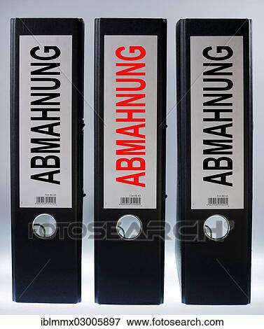 "Three ring binders labelled """"ABMAHNUNG"""", German for """"warning letter""""" View Large Photo Image Stock Photo - "Three ring binders labelled """"ABMAHNUNG"""", German for """"warning letter""""". Fotosearch