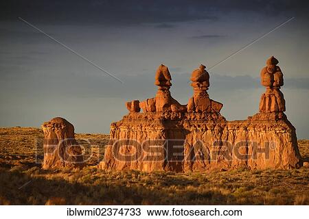 "Three Sisters rock formations, thunderstorm, eroded entrada sandstone hoodoos and rock formations, Goblins, Goblin Valley State Park, San Rafael Reef Desert, Utah, Southwestern USA, USA" View Large Photo Image Stock Image - "Three Sisters rock formations, thunderstorm, eroded entrada sandstone hoodoos and rock formations, Goblins, Goblin Valley State Park, San Rafael Reef Desert, Utah, Southwestern USA, USA". Fotosearch