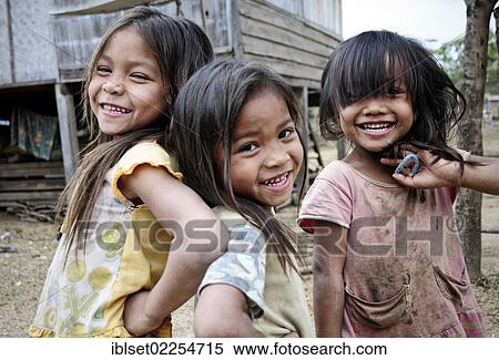 "Three smiling girls, Laos, Southeast Asia, Asia" View Large Photo Image Stock Photography - "Three smiling girls, Laos, Southeast Asia, Asia". Fotosearch