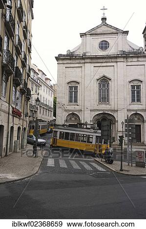 "Three trams near a church, Alfama district, Lisbon, Portugal, Europe" View Large Photo Image Stock Photo - "Three trams near a church, Alfama district, Lisbon, Portugal, Europe". Fotosearch