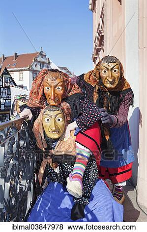 Stock Photo - "Three witches on the balcony of Gengenbach Town Hall, Swabian-Alemannic Fastnacht festival, Gengenbach, Black Forest, Baden-Wurttemberg, Germany, Europe". Fotosearch