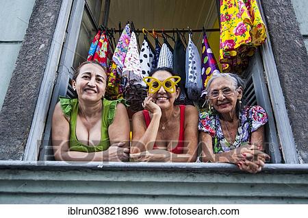 "Three women looking out of a window in Lapa, Rio de Janeiro, Brazil, South America" View Large Photo Image Stock Photograph - "Three women looking out of a window in Lapa, Rio de Janeiro, Brazil, South America". Fotosearch
