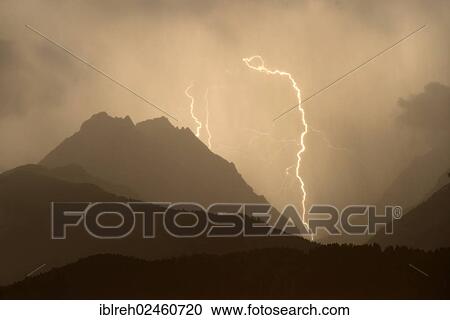 "Thunderstorm, lightning strike in Vomperloch, Karwendel Mountains, Tyrol, Austria, Europe" View Large Photo Image Stock Image - "Thunderstorm, lightning strike in Vomperloch, Karwendel Mountains, Tyrol, Austria, Europe". Fotosearch