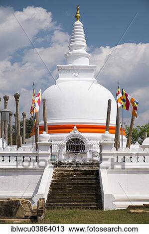 "Thuparama Dagoba, decorated with orange bandages and flags, Anuradhapura, Sri Lanka, Asia" View Large Photo Image Stock Image - "Thuparama Dagoba, decorated with orange bandages and flags, Anuradhapura, Sri Lanka, Asia". Fotosearch