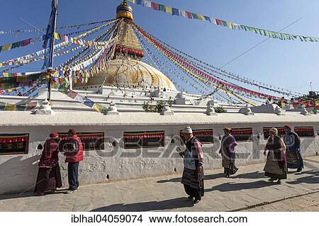 "Tibetan Buddhists, in front of the Boudhanath Stupa, Boudhanath, UNESC World Heritage Site, Kathmandu, Nepal, Asia" View Large Photo Image Picture - "Tibetan Buddhists, in front of the Boudhanath Stupa, Boudhanath, UNESC World Heritage Site, Kathmandu, Nepal, Asia". Fotosearch