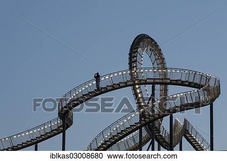 "Tiger & Turtle - Magic Mountain"""" landmark, walkable sculpture in the shape of a rollercoaster, Duisburg, Ruhr district, North Rhine-Westphalia, Germany, Europe" View Large Photo Image Stock Image - "Tiger & Turtle - Magic Mountain"""" landmark, walkable sculpture in the shape of a rollercoaster, Duisburg, Ruhr district, North Rhine-Westphalia, Germany, Europe". Fotosearch