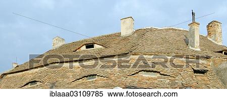 "Tiled roof of a historic building, Sibiu, Transylvania, Romania, Europe" View Large Photo Image Stock Photography - "Tiled roof of a historic building, Sibiu, Transylvania, Romania, Europe". Fotosearch