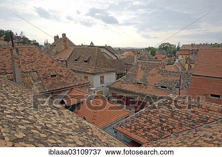 "Tiled roofs of historic buildings, Sibiu, Transylvania, Romania, Europe" View Large Photo Image Stock Photo - "Tiled roofs of historic buildings, Sibiu, Transylvania, Romania, Europe". Fotosearch