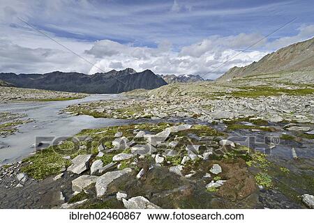 "Timmelsbach stream at Timmelsjoch high mountain pass, Stubai Alps at back, Timmelstal Valley, Tyrol, Austria, Europe" View Large Photo Image Stock Photo - "Timmelsbach stream at Timmelsjoch high mountain pass, Stubai Alps at back, Timmelstal Valley, Tyrol, Austria, Europe". Fotosearch