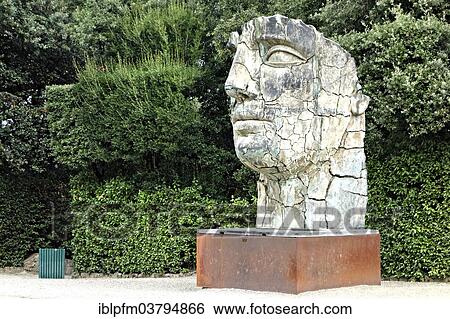 "Tindaro Screpolato, modern sculptured head by artist Igor Mitoraj in the Boboli Gardens, Florence, Tuscany, Italy, Europe" View Large Photo Image Stock Photograph - "Tindaro Screpolato, modern sculptured head by artist Igor Mitoraj in the Boboli Gardens, Florence, Tuscany, Italy, Europe". Fotosearch