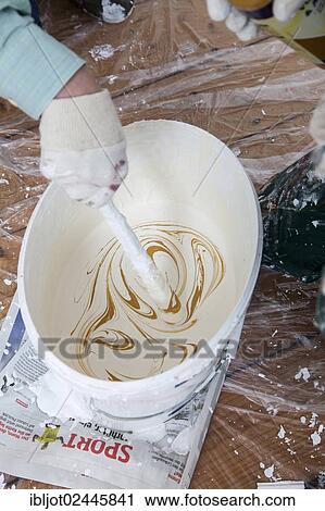 Tinting paint for painting the walls View Large Photo Image Stock Image - Tinting paint for painting the walls. Fotosearch
