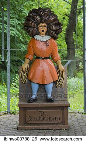 Stock Photograph - "Title character from the """"Struwwelpeter"""" children's book by Heinrich Hoffmann, carved in wood by Guenther Gerke, Struwwelpeter Park, Tabarz, Thuringia, Germany, Europe". Fotosearch