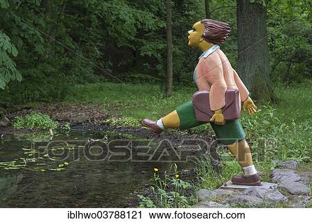 "Title character of """"The Story of Johnny Head-in-Air"""", from the """"Struwwelpeter"""" children's book by Heinrich Hoffmann, carved in wood by Guenther Gerke, Struwwelpeter Park, Tabarz, Thuringia, Germany, Europe" View Large Photo Image Stock Image - "Title character of """"The Story of Johnny Head-in-Air"""", from the """"Struwwelpeter"""" children's book by Heinrich Hoffmann, carved in wood by Guenther Gerke, Struwwelpeter Park, Tabarz, Thuringia, Germany, Europe". Fotosearch