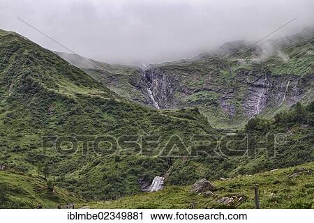"Top of a valley with waterfalls coming from Hocharn Glacier, Rauris, Krumltal valley, Hohe Tauern National Park, Salzburg, Austria, Europe" View Large Photo Image Stock Image - "Top of a valley with waterfalls coming from Hocharn Glacier, Rauris, Krumltal valley, Hohe Tauern National Park, Salzburg, Austria, Europe". Fotosearch