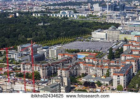 "Top view of the centre of Berlin and the 2711 steles of the Holocaust Memorial, the Government District, the main train station and a part of Berlin-Tiergarten, Berlin, Germany, Europe" View Large Photo Image Stock Photography - "Top view of the centre of Berlin and the 2711 steles of the Holocaust Memorial, the Government District, the main train station and a part of Berlin-Tiergarten, Berlin, Germany, Europe". Fotosearch