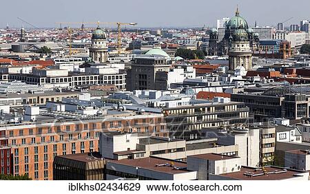 "Top view of the centre of Berlin with the German and French Cathedrals on Gendarmenmarkt square, Berlin Cathedral, Berlin, Germany, Europe" View Large Photo Image Stock Photo - "Top view of the centre of Berlin with the German and French Cathedrals on Gendarmenmarkt square, Berlin Cathedral, Berlin, Germany, Europe". Fotosearch