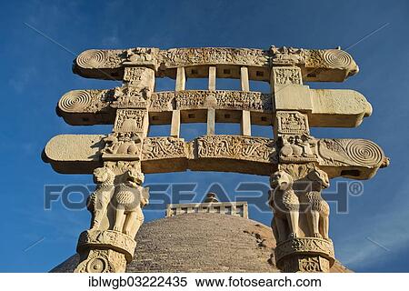 Stock Photography - "Toran or sacred gateway with stone reliefs at the Buddhist stupa, Stupa No. 1, a large stupa from 2nd century BC, UNESCO World Cultural Heritage Site, Sanchi, Madhya Pradesh, India, Asia". Fotosearch