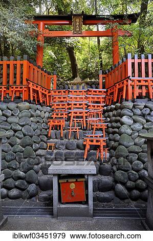 "Torii at a sacred place in the forest, many small Torii as votive offerings, Fushimi Inari Taisha Shinto shrine, Fushimi, Kyoto, Kinki region, Japan, Asia" View Large Photo Image Stock Photo - "Torii at a sacred place in the forest, many small Torii as votive offerings, Fushimi Inari Taisha Shinto shrine, Fushimi, Kyoto, Kinki region, Japan, Asia". Fotosearch