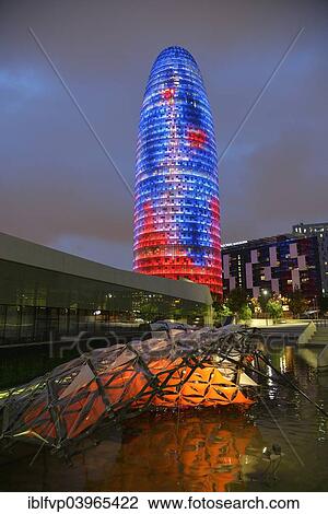 Stock Image - "Torre Agbar, architect Jean Nouvel, at dusk, Avinguda Diagonal, Barcelona, â€‹â€‹Catalonia, Spain, Europe". Fotosearch