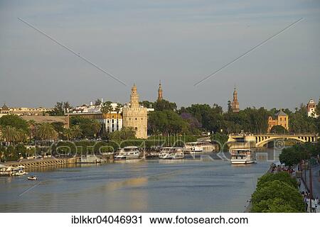 Stock Image - "Torre del Oro on the waterfront of the Rio Guadalquivir, Seville, Andalucia, Spain, Europe". Fotosearch