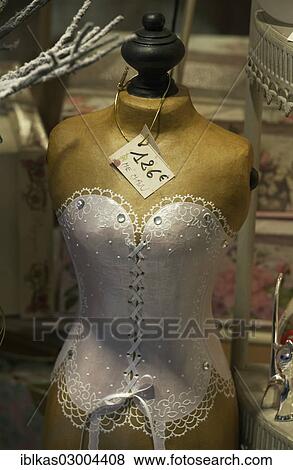 "Torso of a shop-window mannequin wearing a garter bustier in a shop window, Passage Jouffroy, Grands Boulevards, 2nd Arrondissement, Paris, Ile-de-France, France, Europe" View Large Photo Image Stock Photo - "Torso of a shop-window mannequin wearing a garter bustier in a shop window, Passage Jouffroy, Grands Boulevards, 2nd Arrondissement, Paris, Ile-de-France, France, Europe". Fotosearch