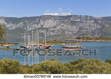 "Tour boats at Sedir Island, Marmaris, Gulf of Gokova, Aegean, Mugla Province, Turkey, Asia" View Large Photo Image Stock Photo - "Tour boats at Sedir Island, Marmaris, Gulf of Gokova, Aegean, Mugla Province, Turkey, Asia". Fotosearch